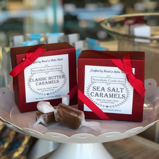 Red gift box of 8 Serendipity classic caramels, butter or sea salt flavor. Wrapped in a pretty red ribbon.