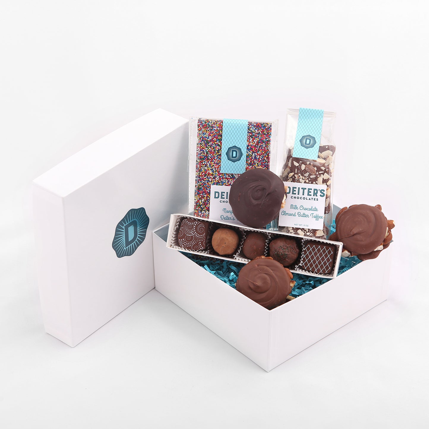 gift box of nonpareil bar, almond butter toffee, pecan turtles and 5-piece truffles